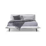 Enjoy modern contemporary home furniture like this serene Piuma bed from Natuzzi Italia.