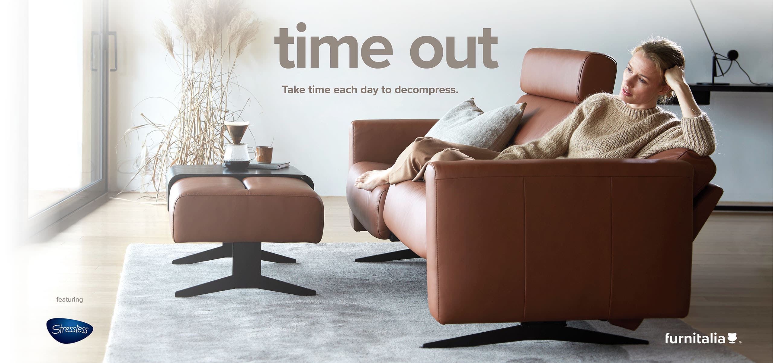 Enjoy modern contemporary home furniture like this sofa and ottoman from Stressless®.