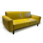Natuzzi Editions C139 Raffinato Sofa 15D2 LeMans yellow showroom view