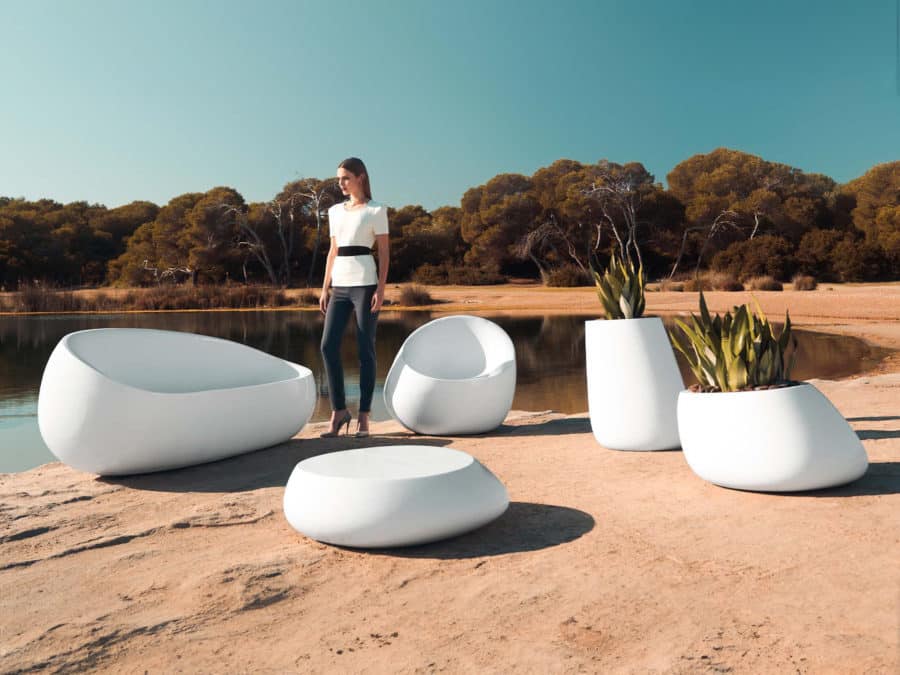 Vondom - STONE collection showing sofa, lounge chair, coffee table, and various planters