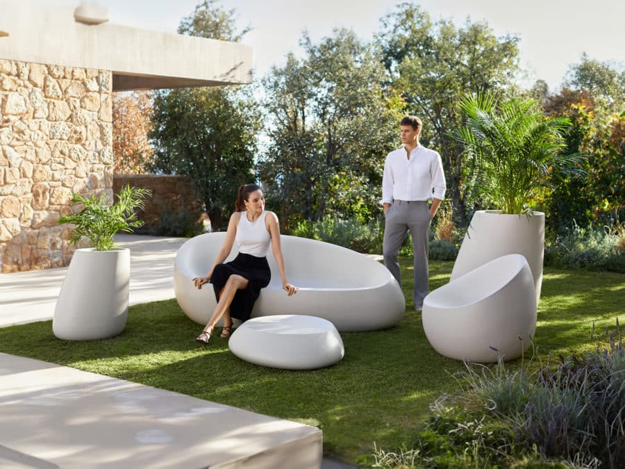 Vondom - STONE collection showing sofa, lounge chair, coffee table, and various planters